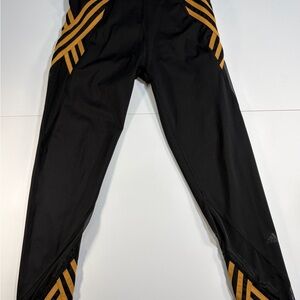 Adidas X Ivy Park Women's Black and Gold Leggings